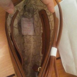 Cross Calvin Klein bag.